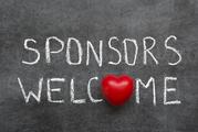 sponsors welcome phrase handwritten on chalkboard with heart symbol instead of O